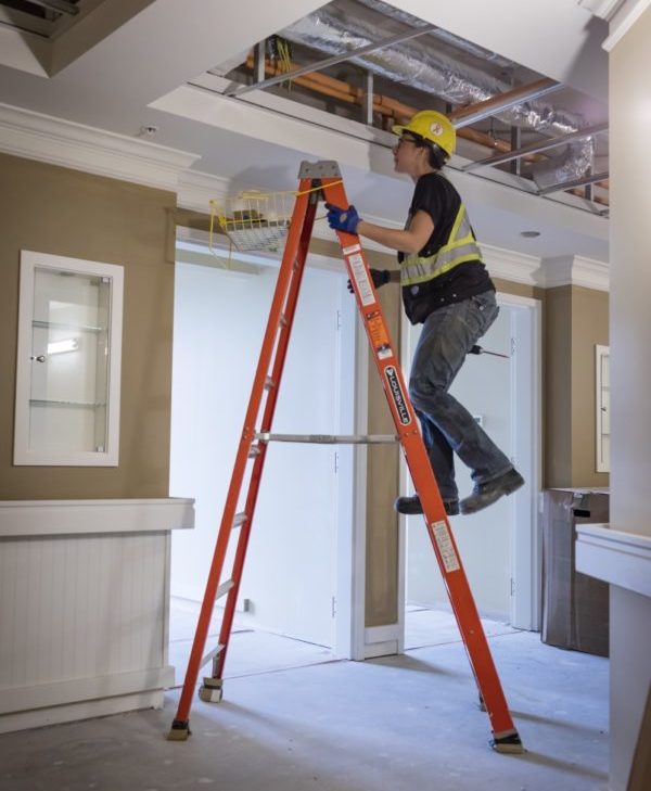 Man climbing on ladder